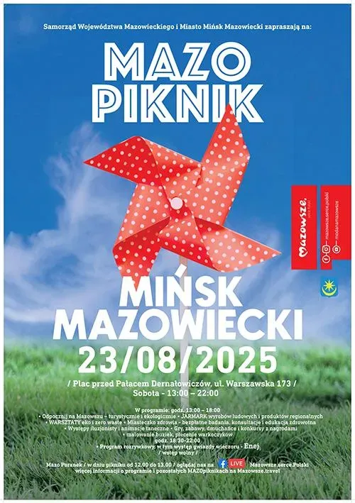 Czerwony wiatrak z białymi kropkami na tle niebieskiego nieba i zielonej trawy oraz tekst informujący o wydarzeniu Mazo Piknik w Mińsku Mazowieckim 23 sierpnia 2025.